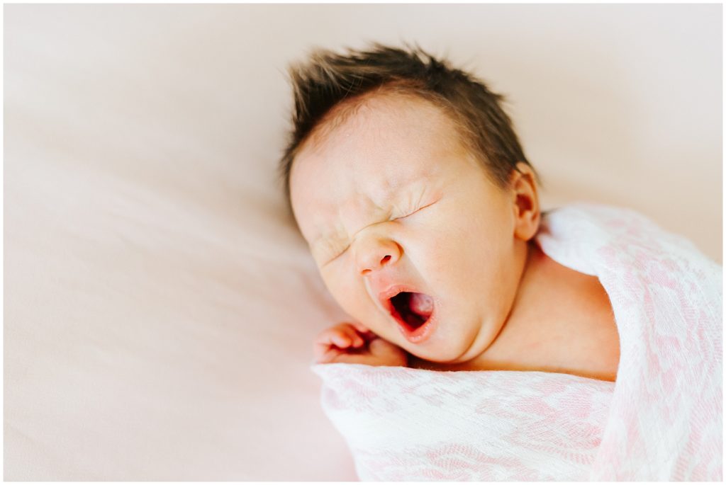 Baby Yawning newborn in home lifestyle session