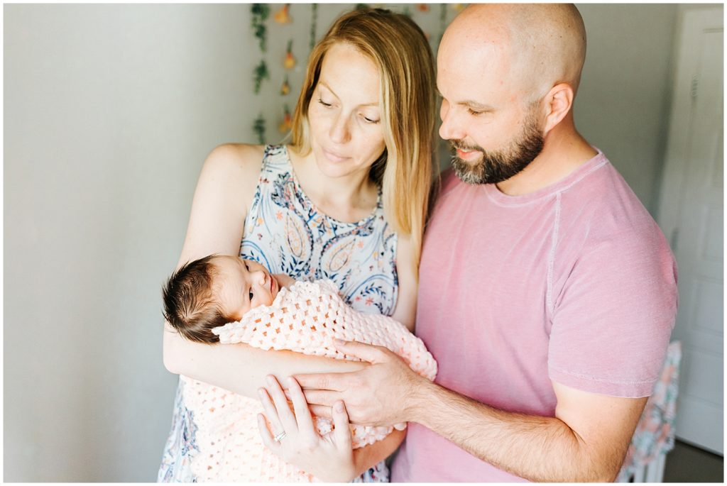 Mom, Dad, and Baby newborn lifestyle session