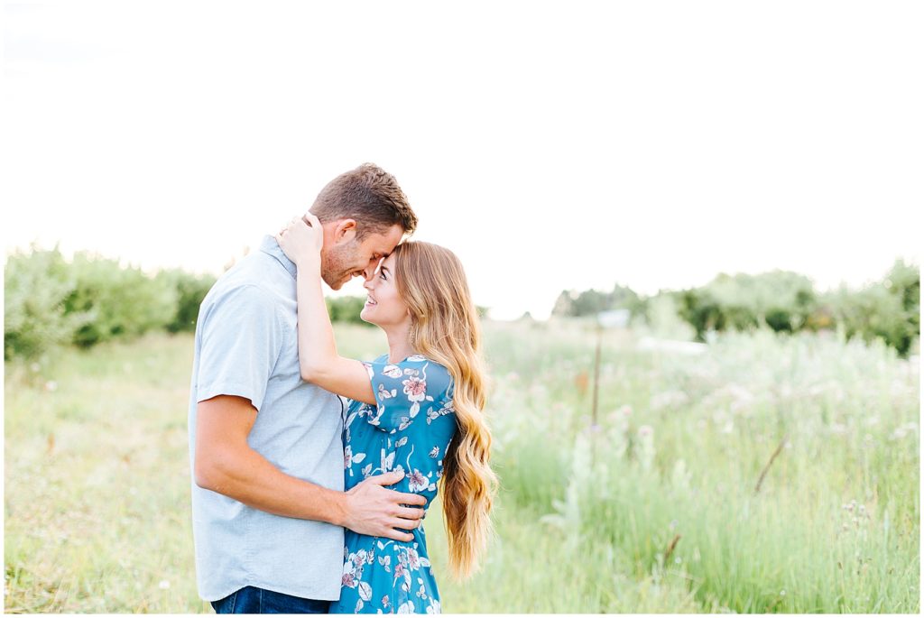 Dreamy summer orchard engagement