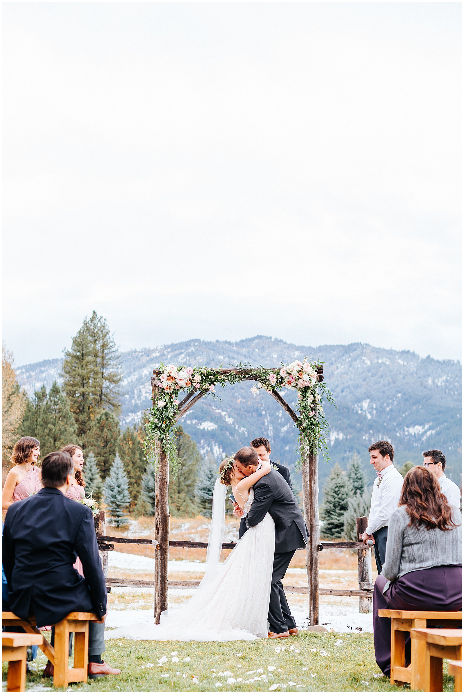 Ceremony Kiss at Mountain Backdrop Fall Wedding