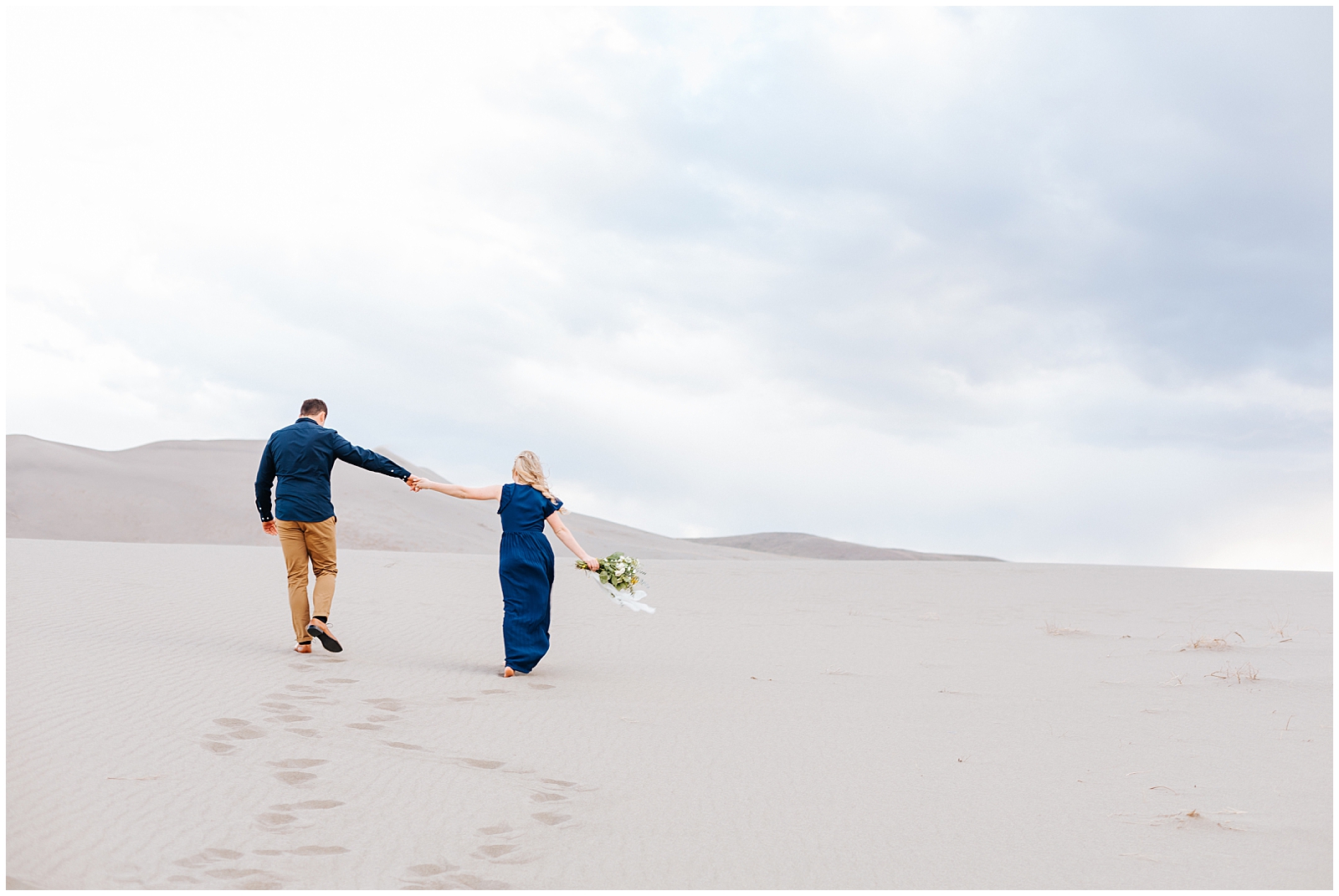 Stormy Sand Dunes Engagement Photos