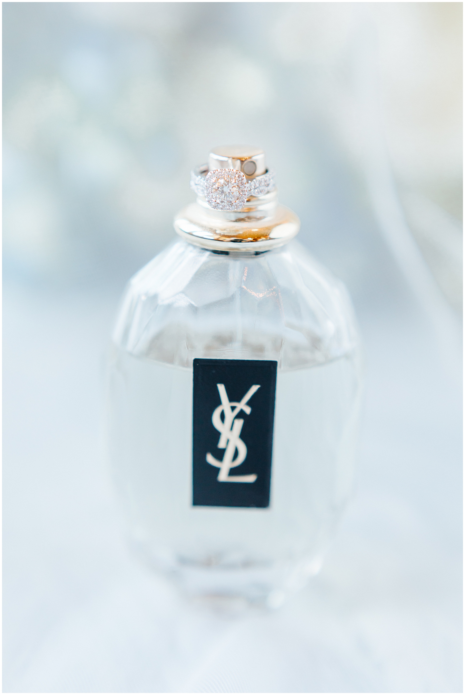 Intimate Still Water Hollow Wedding Perfume Detail Photo with Engagement Ring