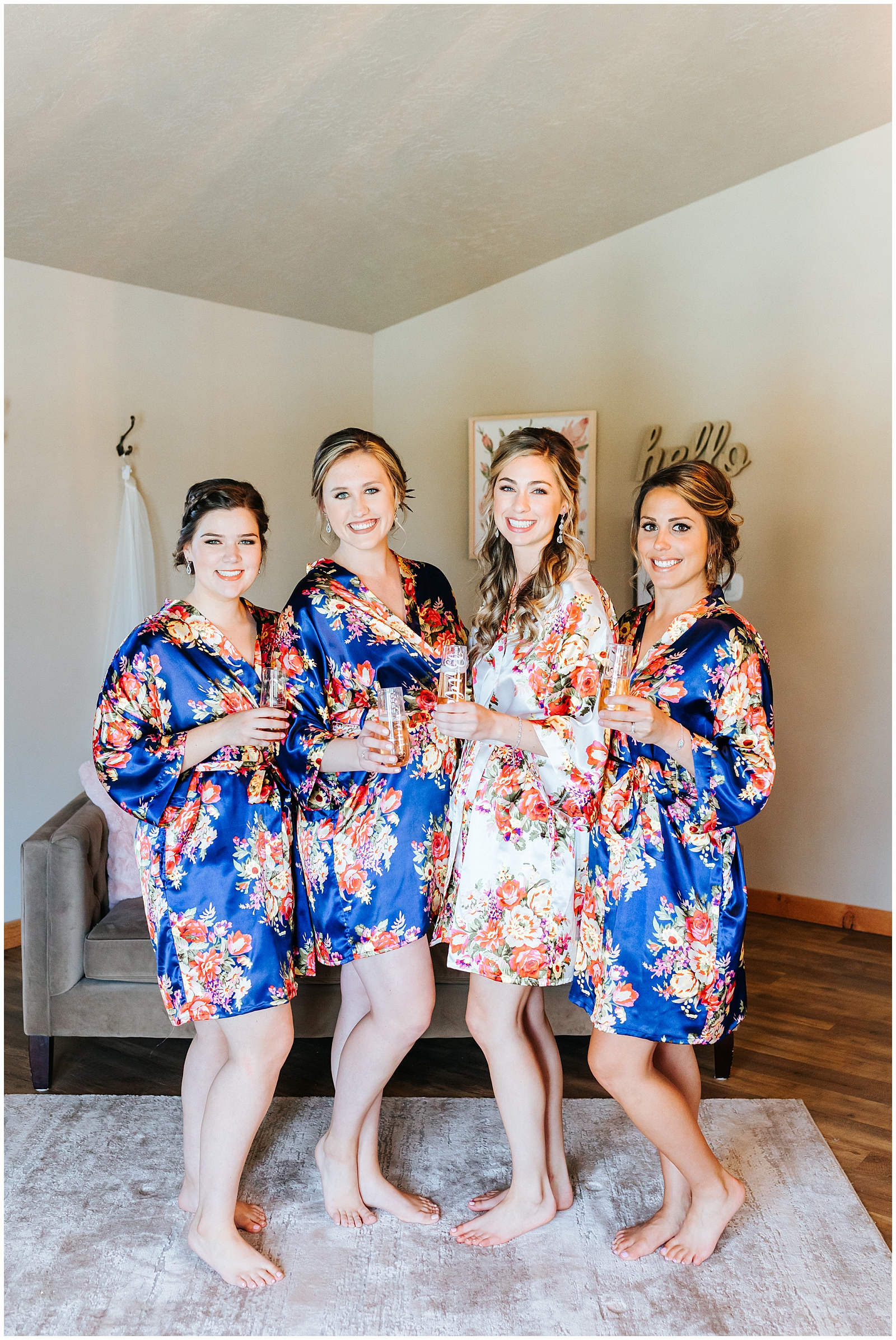 Bridesmaids Getting Ready in Floral Robes before Wedding Ceremony