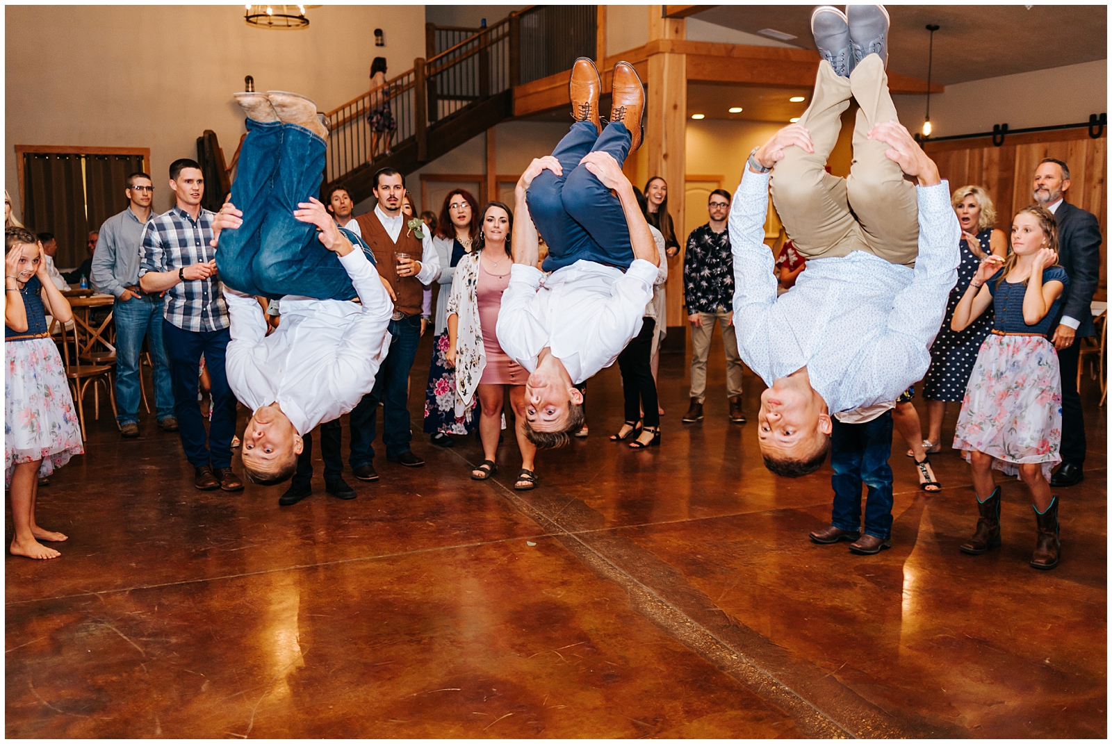 Three Simultaneous Backflips at Wedding Reception Dance Floor