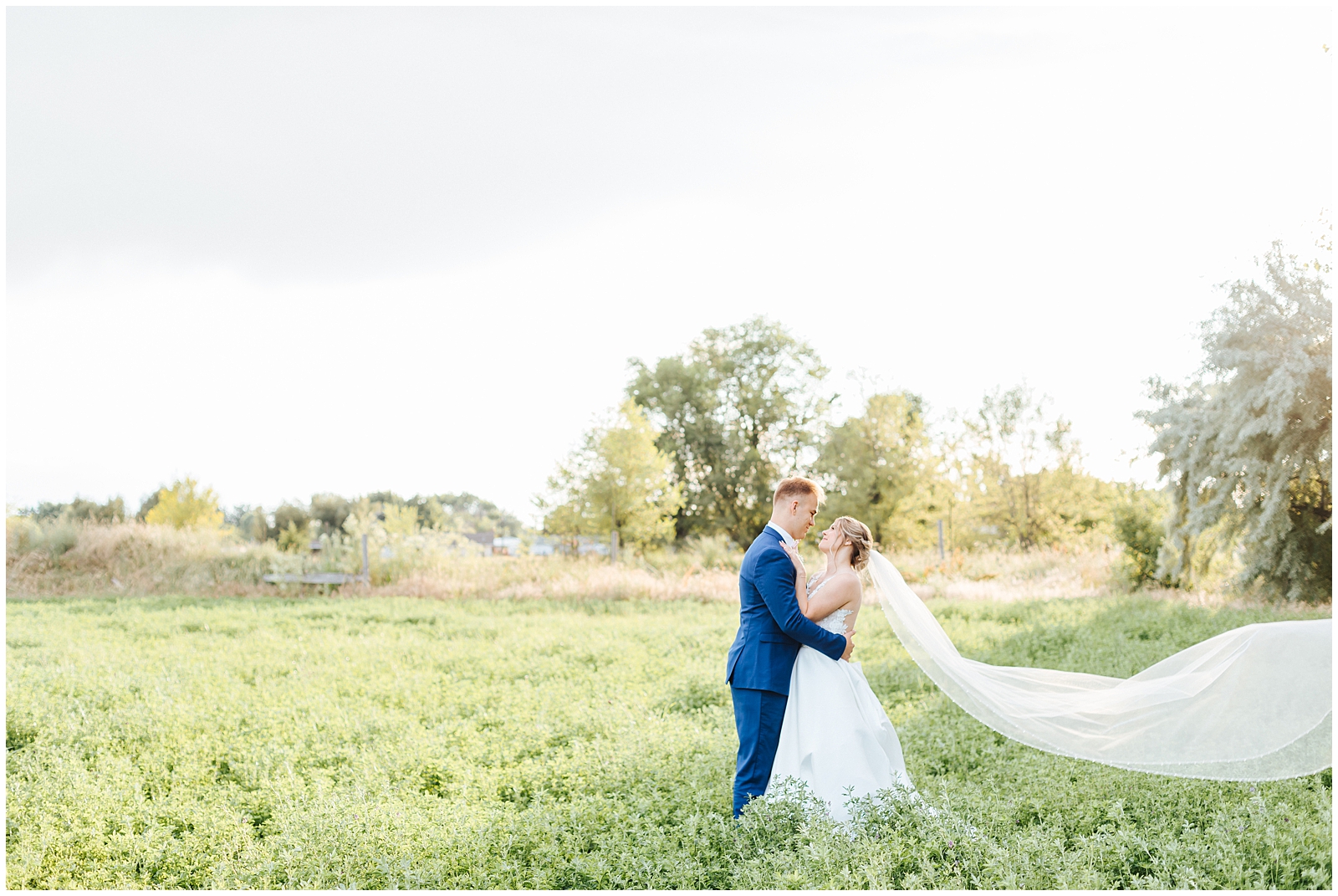 Cathedral Length Floating Veil at Husband and Wife Golden Hour Portraits at Fourth Street Gardens Wedding