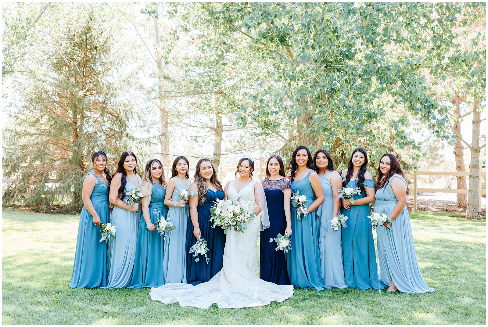 Bridal Party Bridesmaids in Mixture of Navy and Dusty Blue Floor Length Dresses