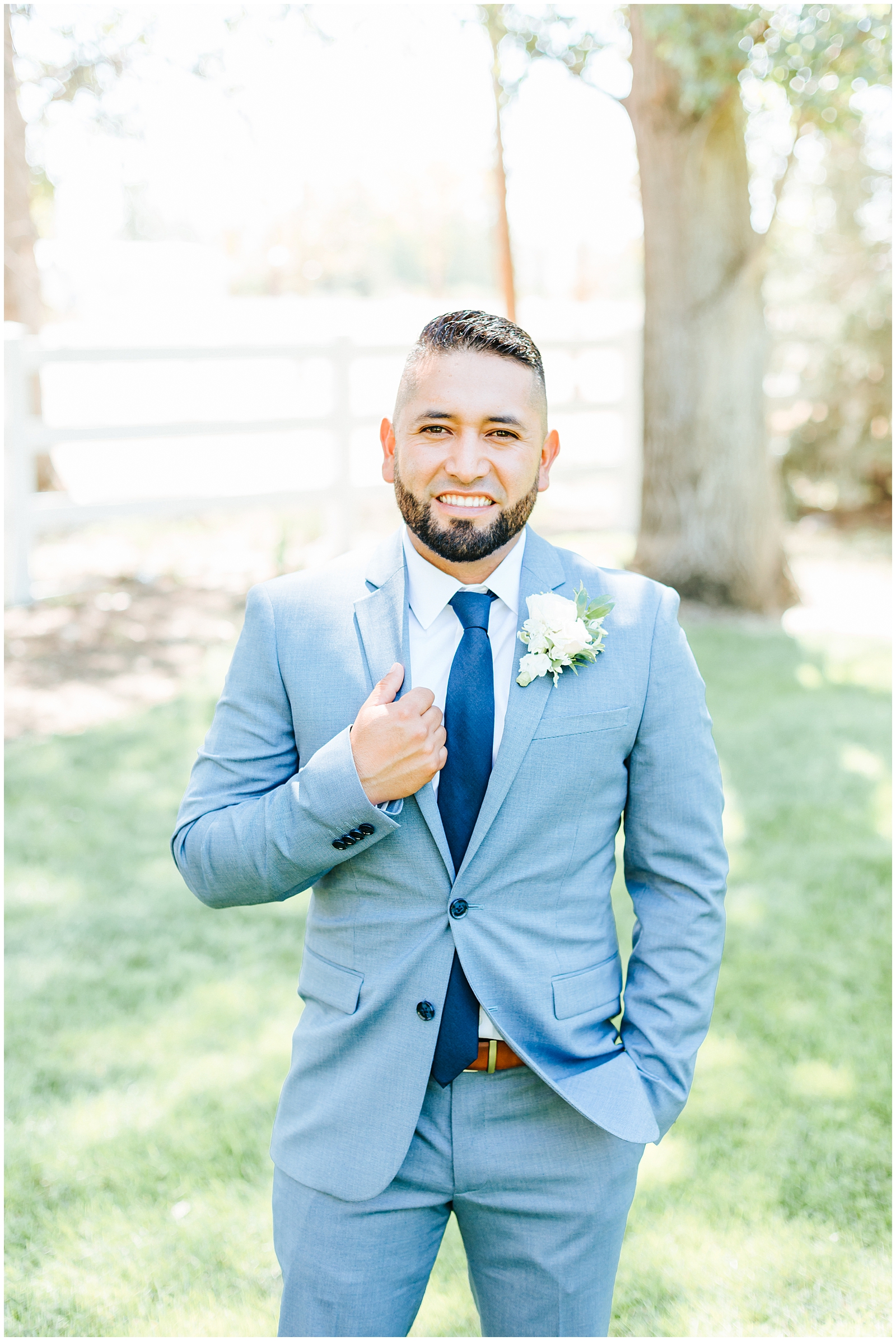 Grey suit with Navy Tie for the Groom
