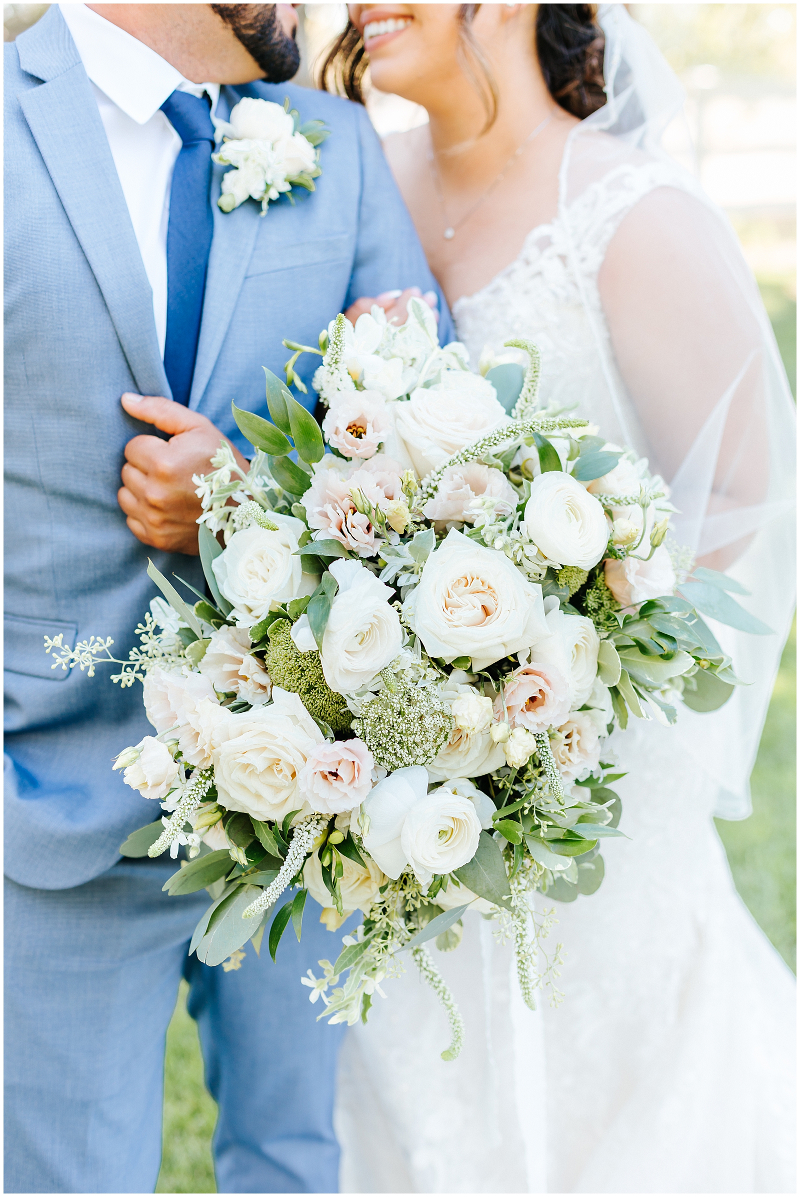 White, cream, and blush rose Bridal Bouquet by Posies Floral Design