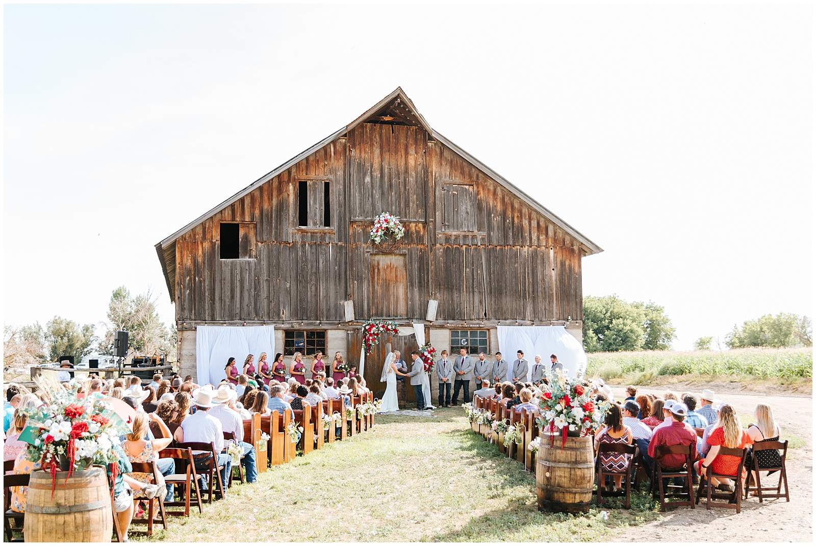 Rustic Barn as Ceremony Backdrop at Private Idaho Ranch Wedding