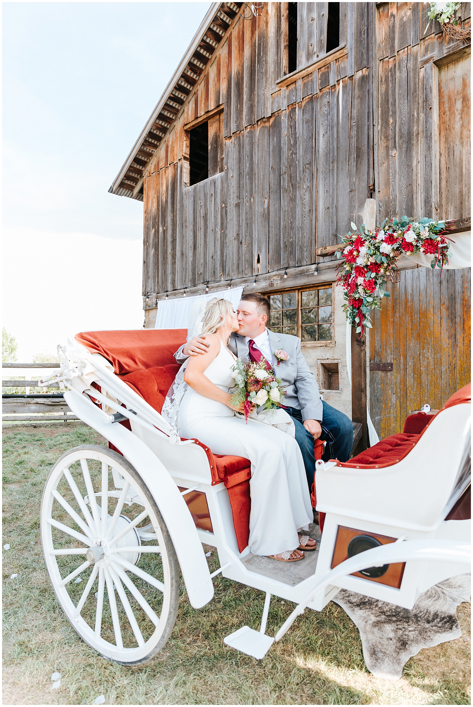 Bride and Groom exiting their Ceremony in a Horse Drawn Carriage