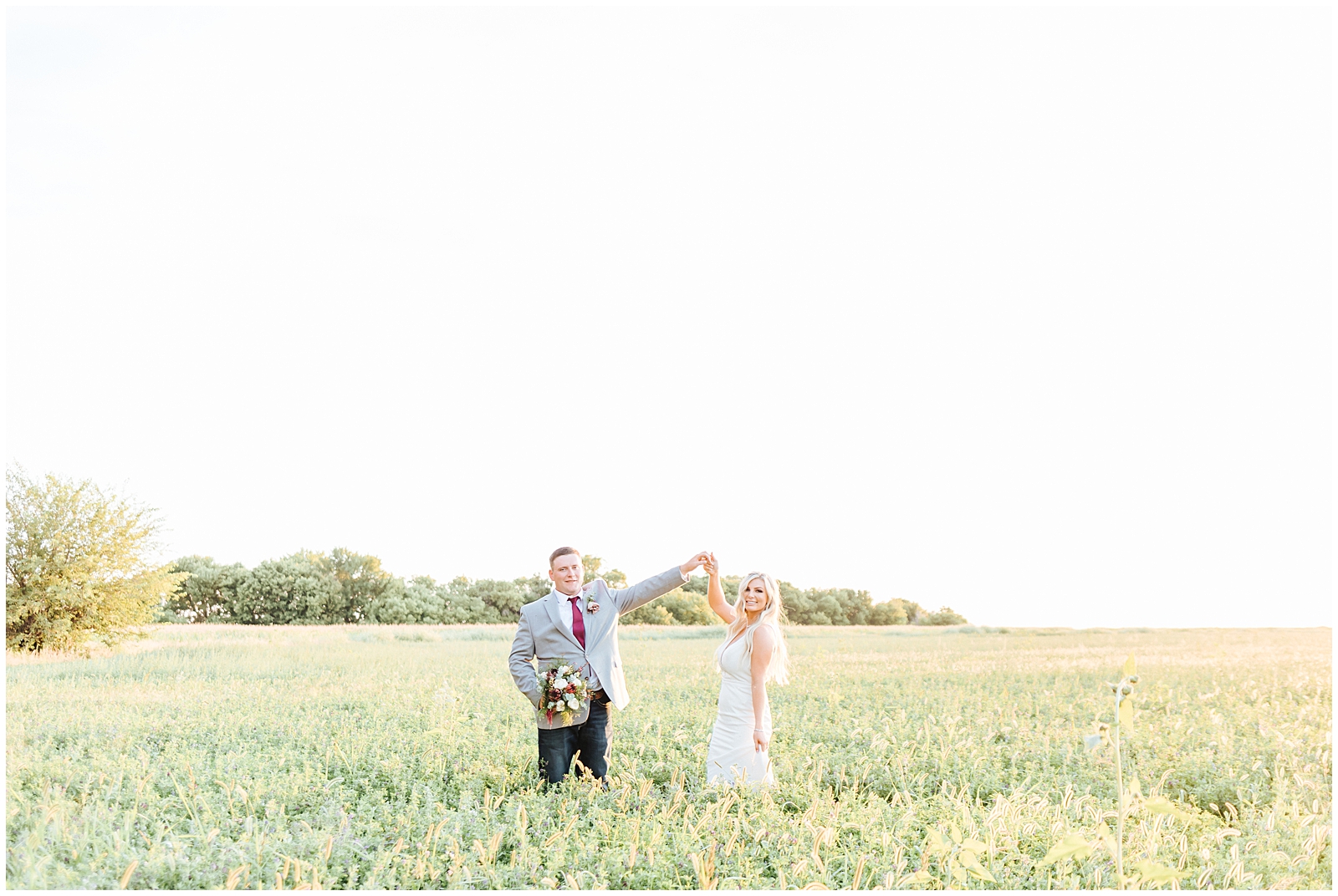 Twirling in Farm Field at Private Idaho Ranch Wedding