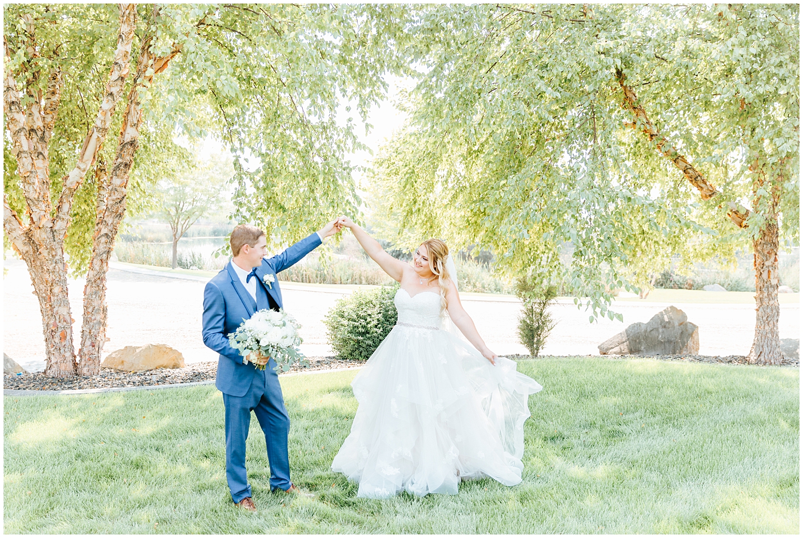 Bride and Groom Portraits Twirling at A Creekside Affair Wedding