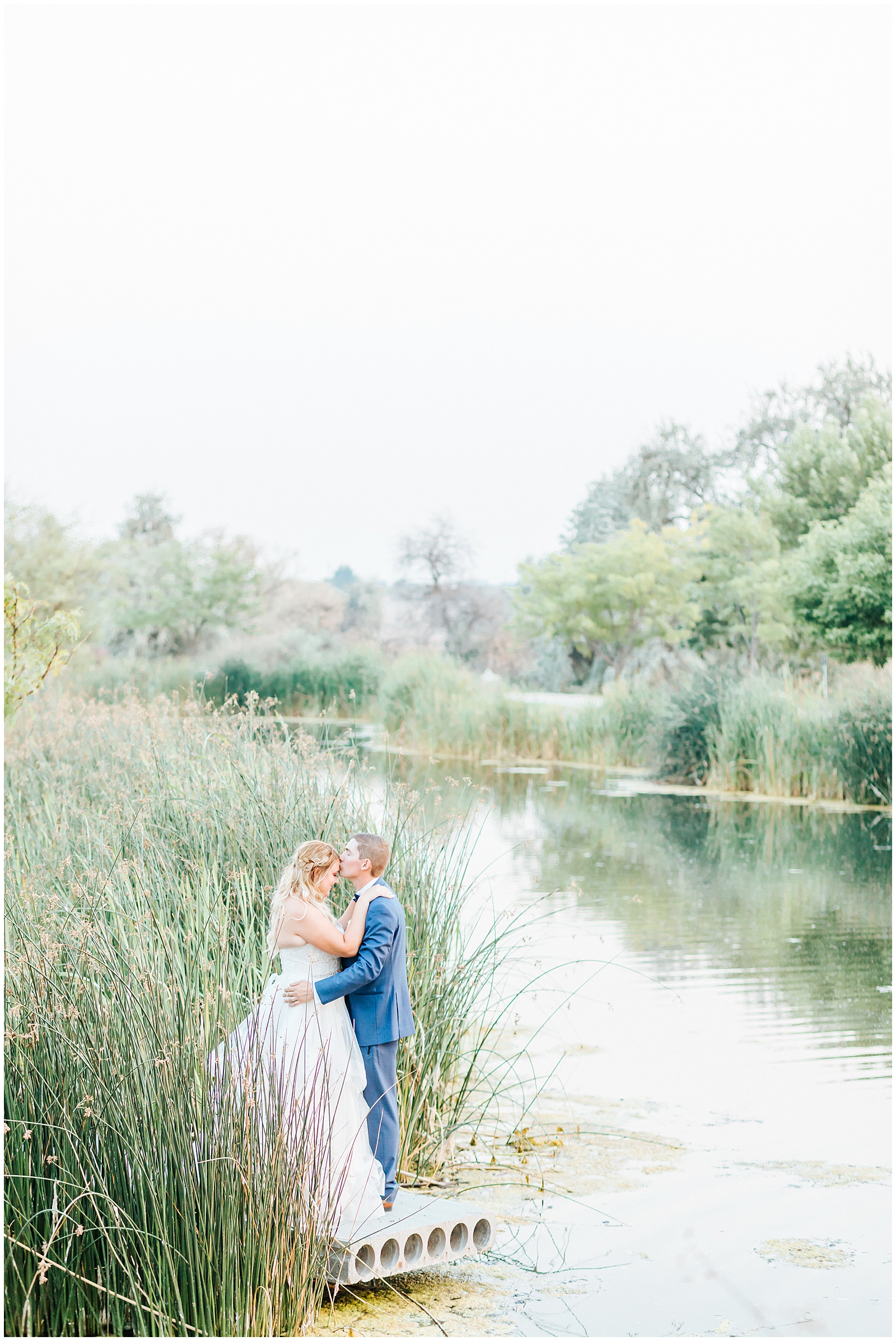 Stunning Water backdrop for bride and groom sunset portraits in Idaho 