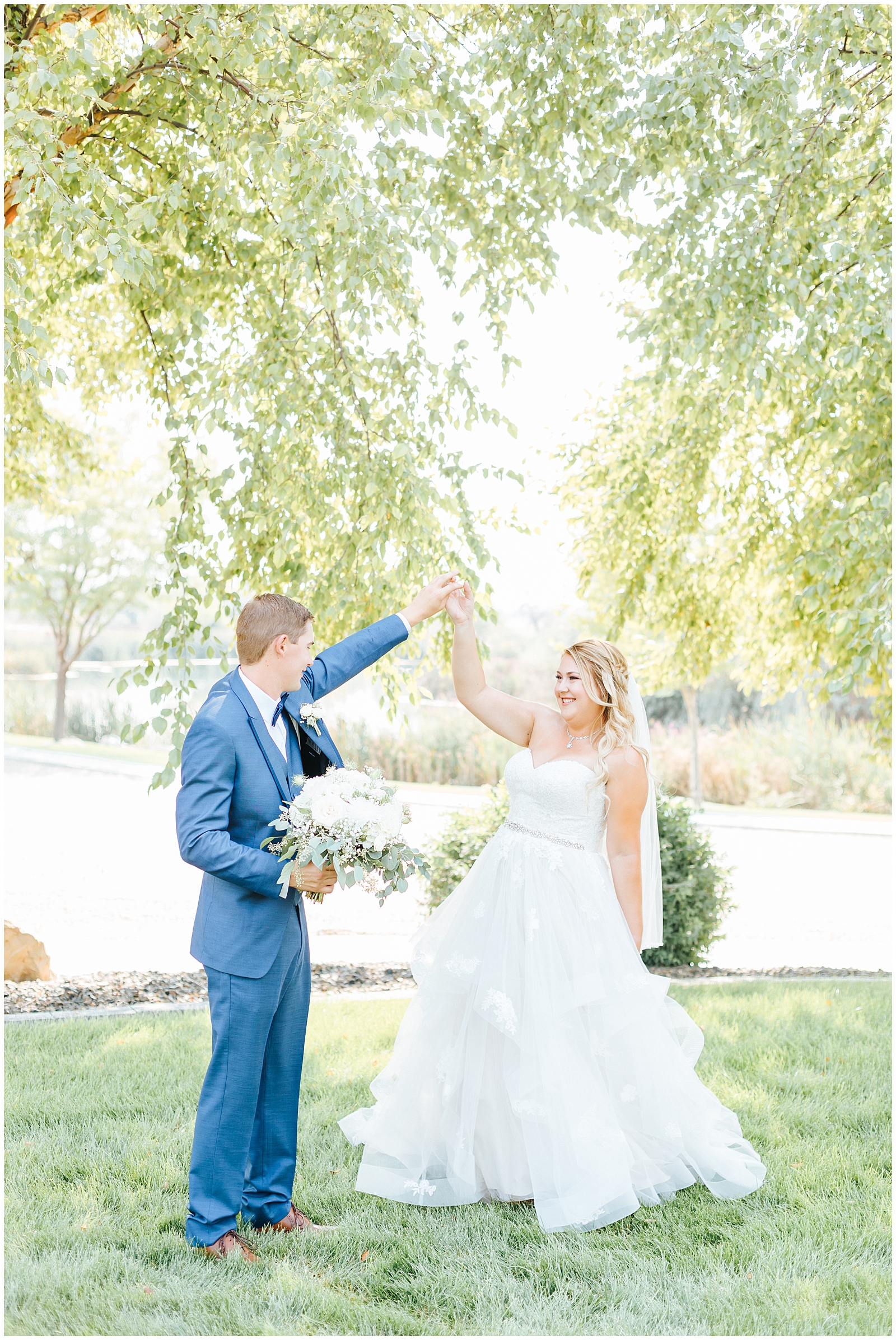 Bride and Groom Twirling and Dancing at A Creekside Affair Wedding