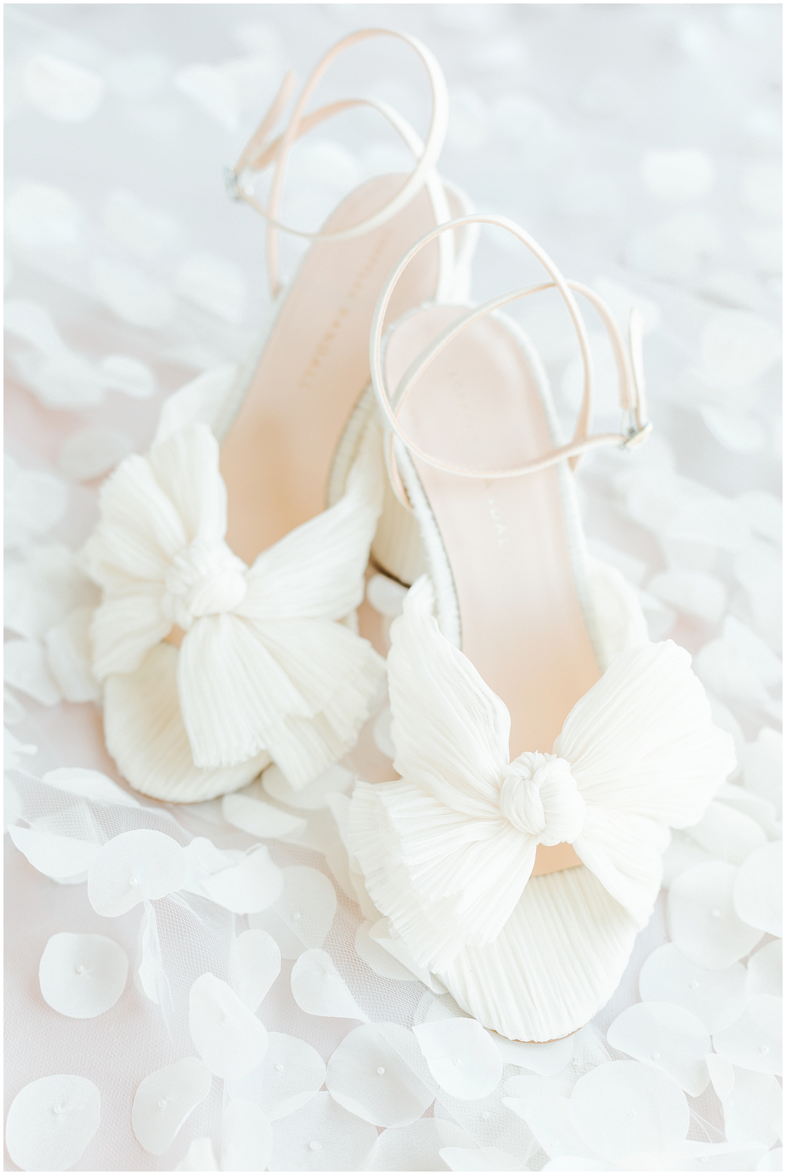 Romantic Bridal Shoes BHLDN on top of petal showered veil