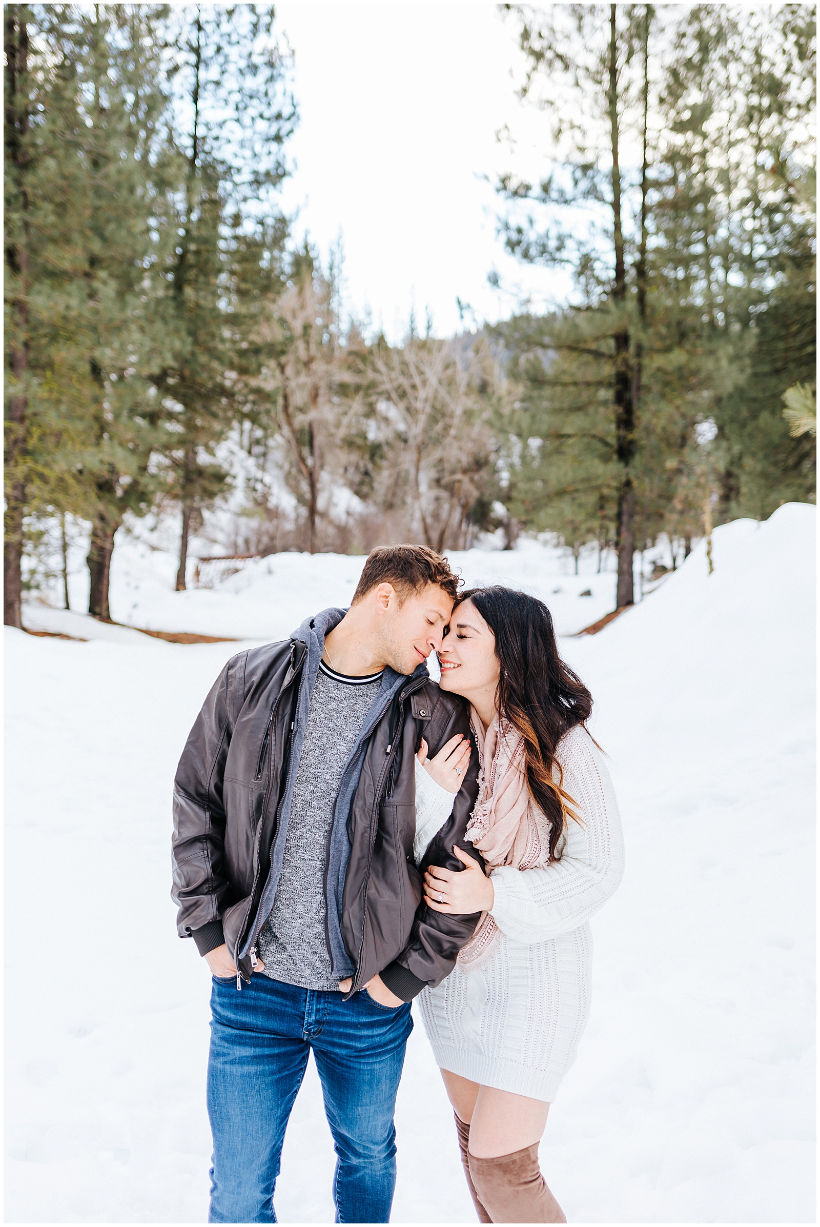 Idaho City Mountain Engagement Snuggling in Snow