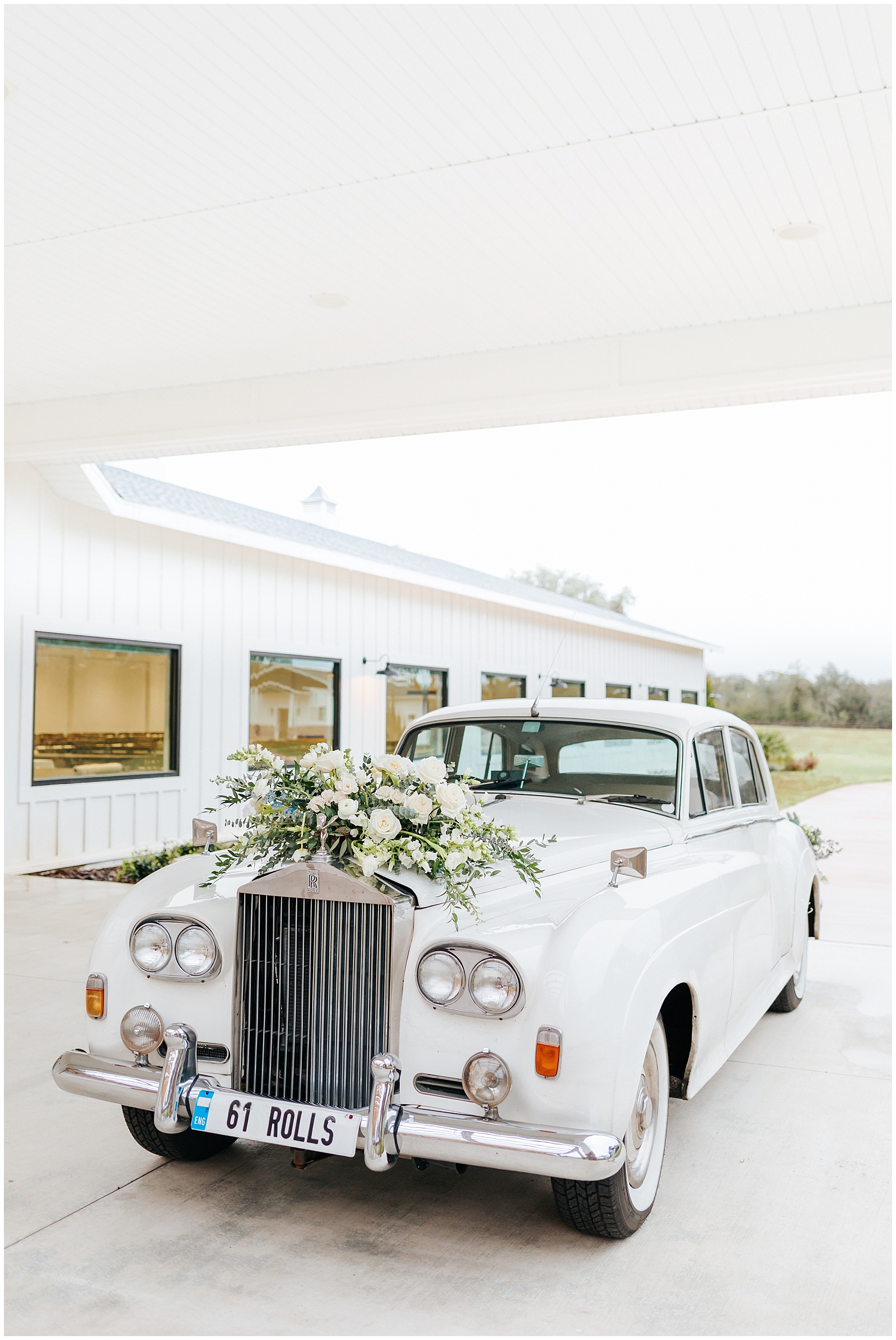 Vintage White Rolls Royce with Floral Garland at Classic Elegant Florida Wedding