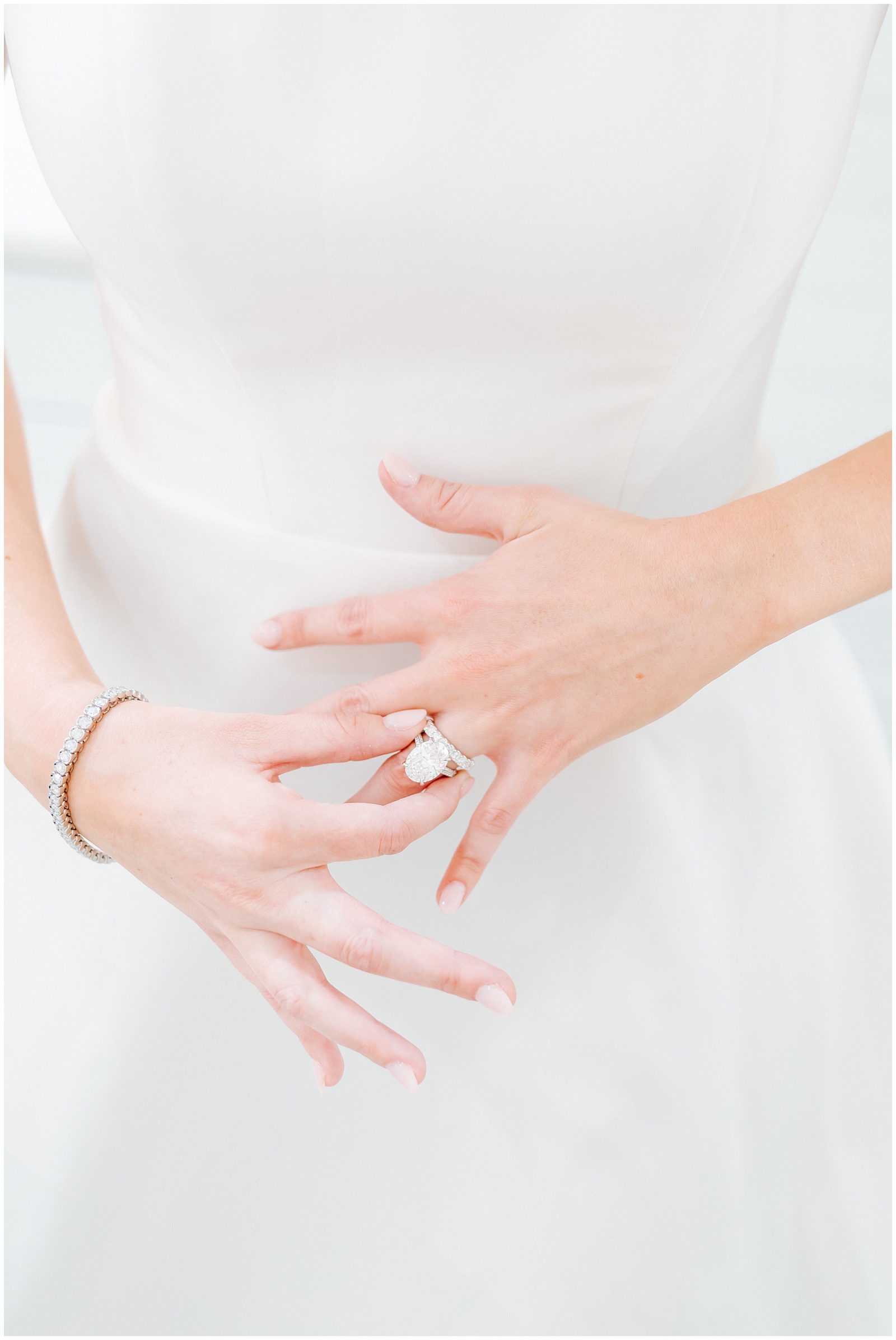 Detail of Bride putting on 10 carat engagement ring at Classic Elegant Florida Wedding