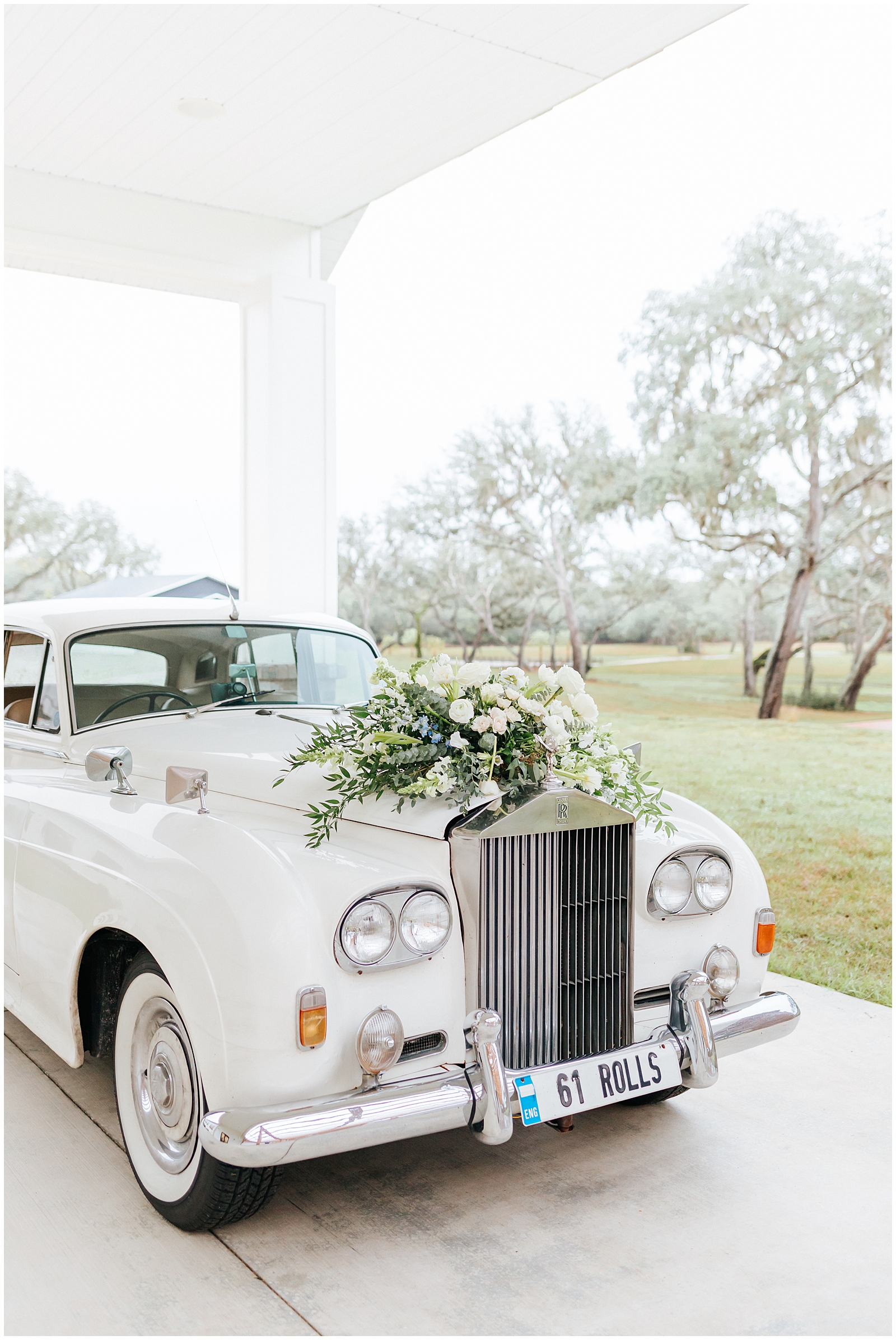 1961 Vintage Rolls Royce in White with Floral Installation at Wedding - Grand Exit Car