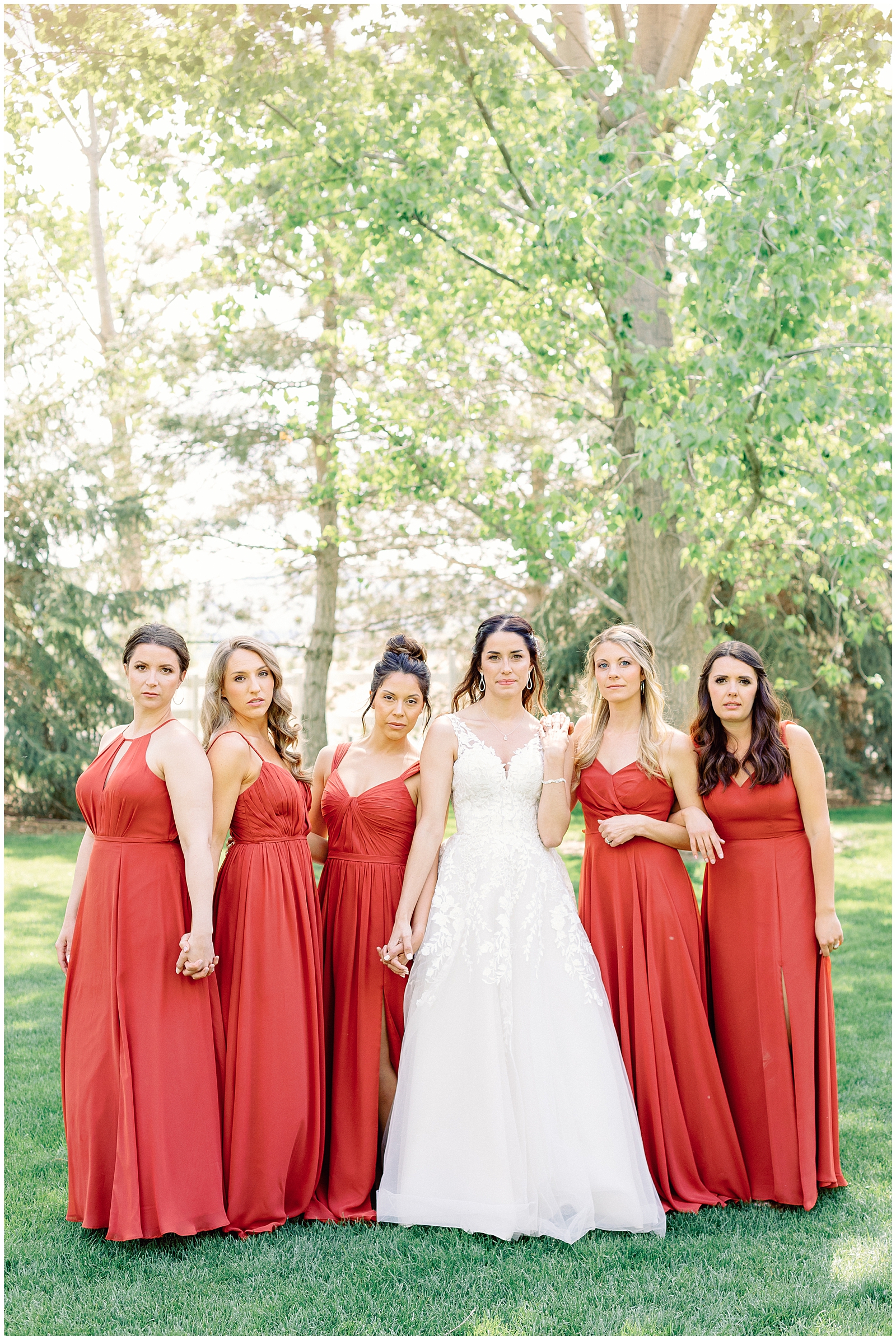 Idaho Spring Vineyard Wedding Bridesmaids in rusted red