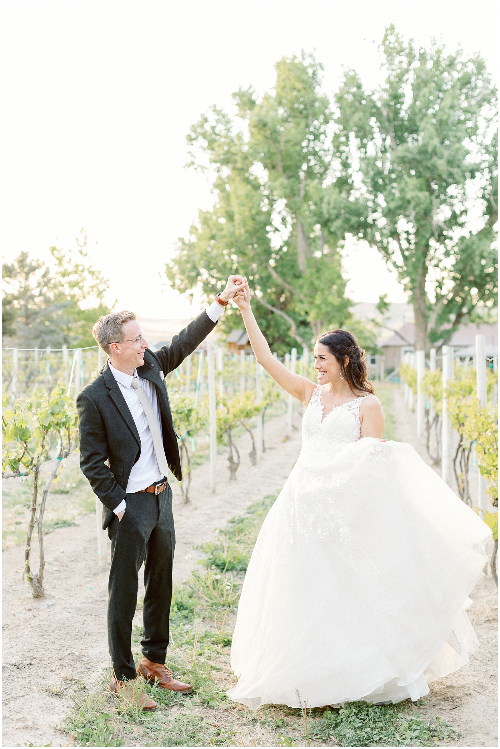 Twirling Bride at Idaho Spring Vineyard Wedding