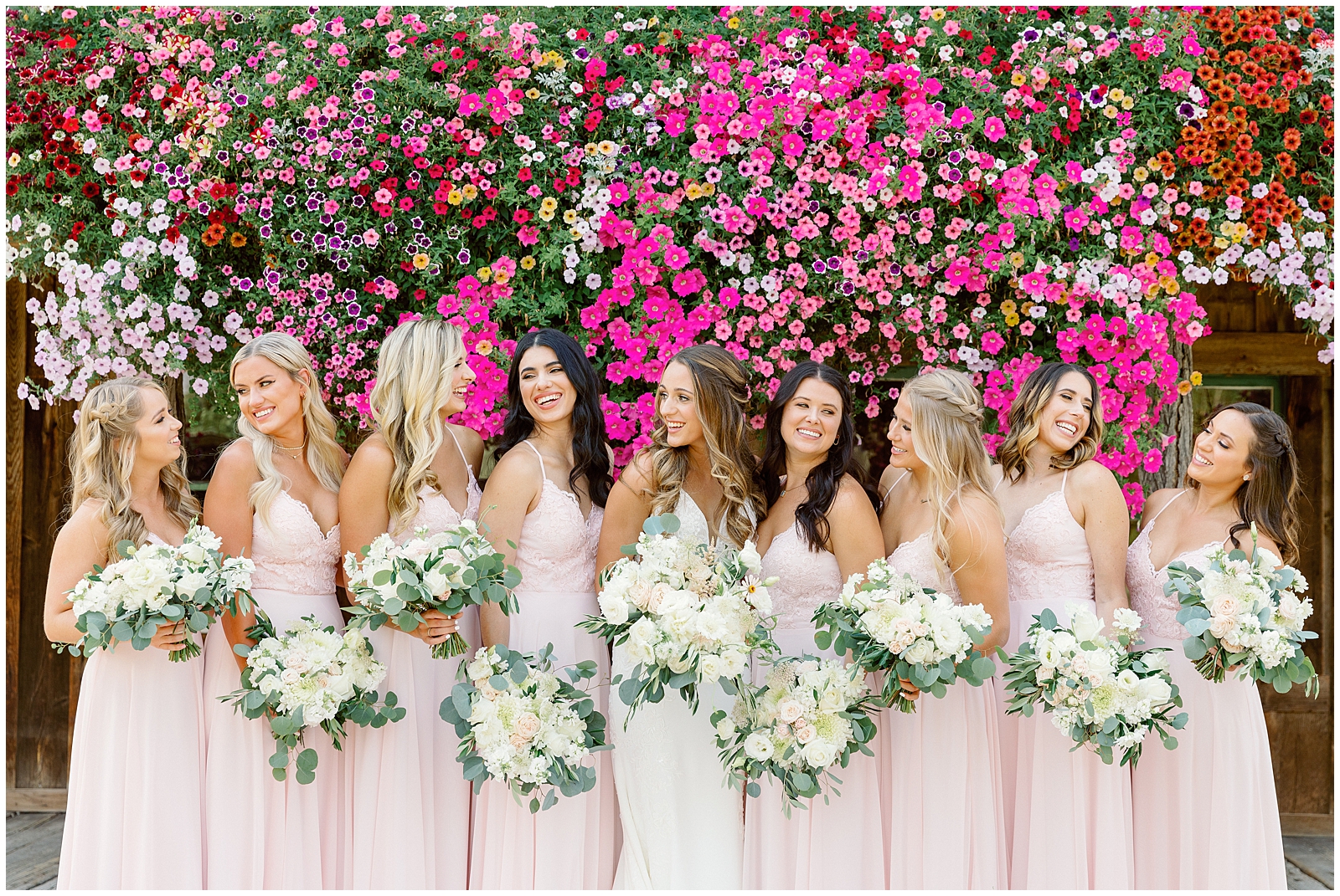 Bride with her bridesmaids at blush Still Water Hollow Wedding