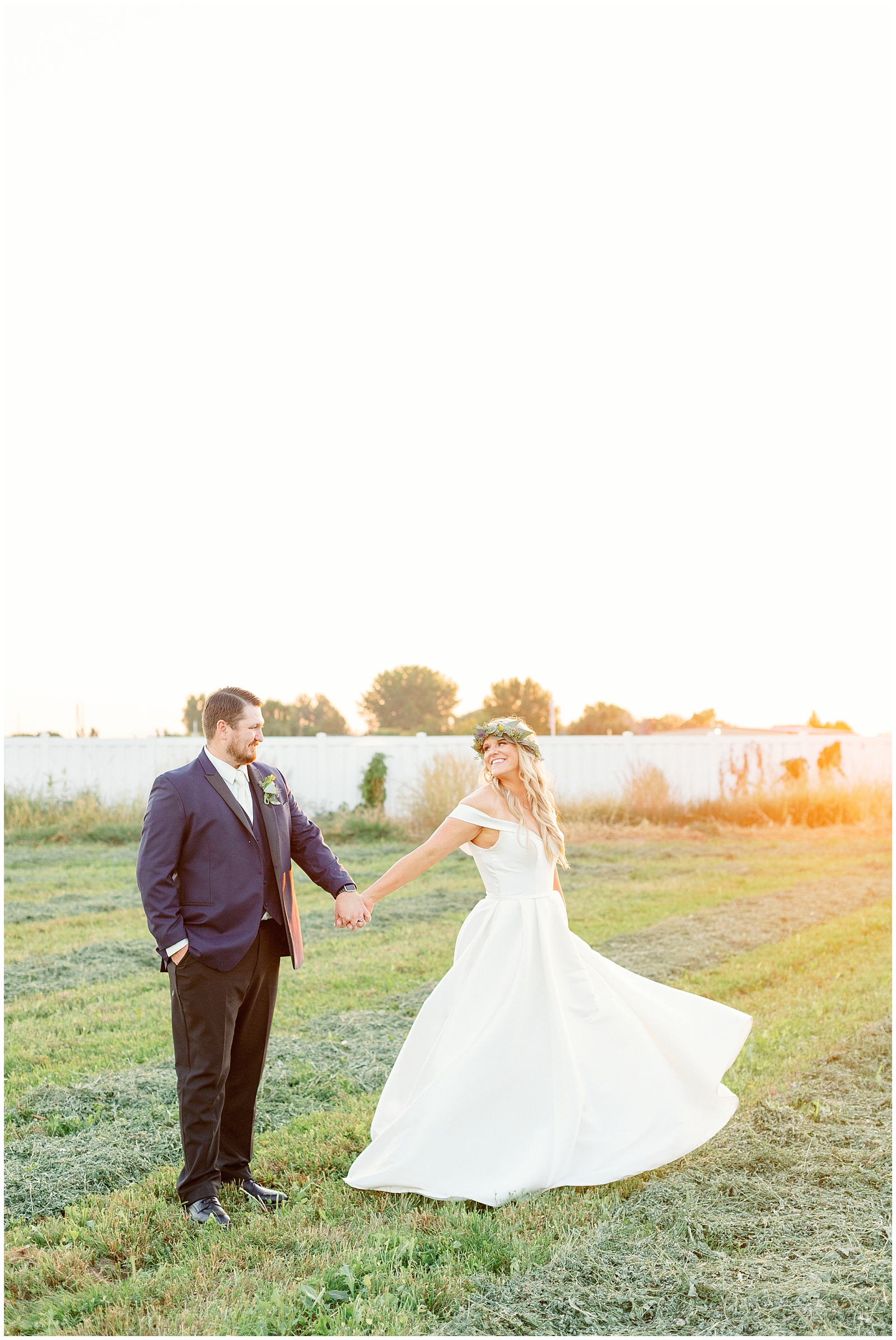 Husband and Wife golden hour portraits at White barn at Happy Valley